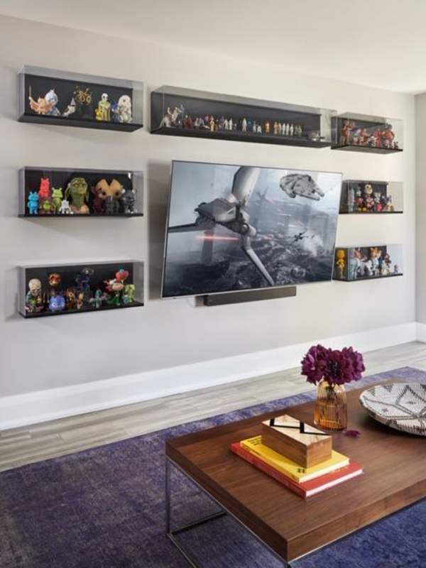 TV-wall-display-with-action-figure-backdrop