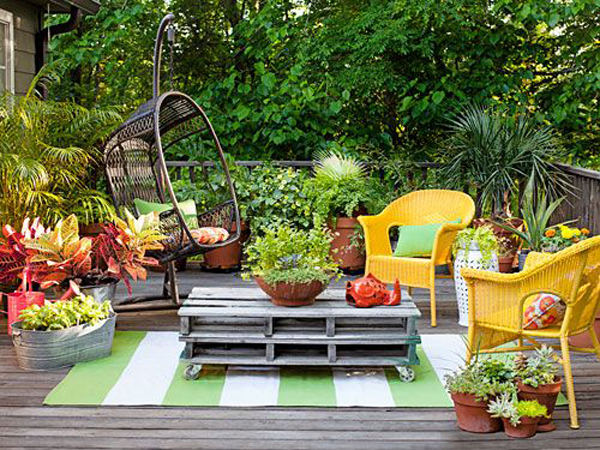 colorful-diy-backyard-deck-with-hanging-chair