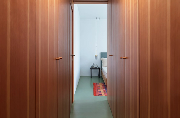 wood-bedroom-hallway-with-cabinet