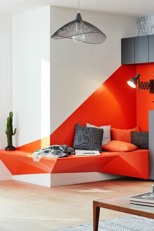 modern-reading-nook-with-red-accent-wall