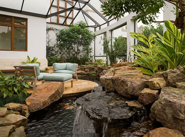 stone-koi-pond-design-with-outdoor-living-space