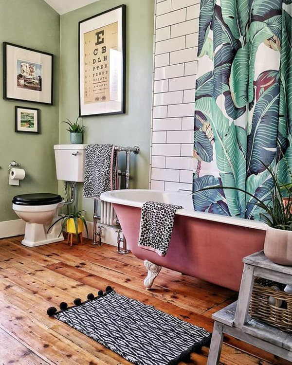 cozy-tropical-pink-bathtub-design-with-wooden-floor