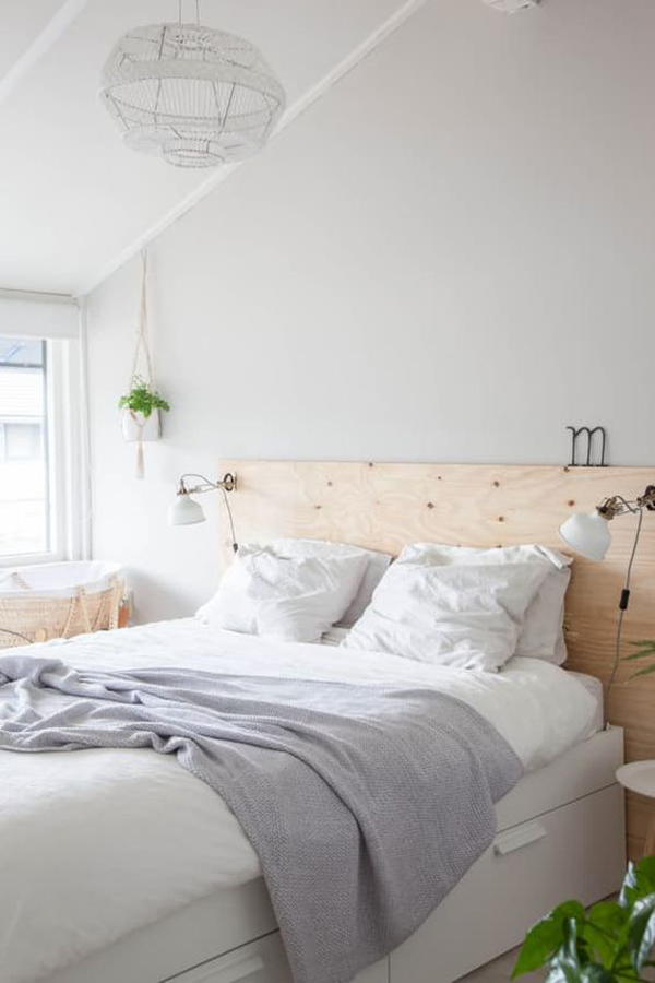 wood-bedroom-headboard-with-ikea-ranarp-wall-lamp