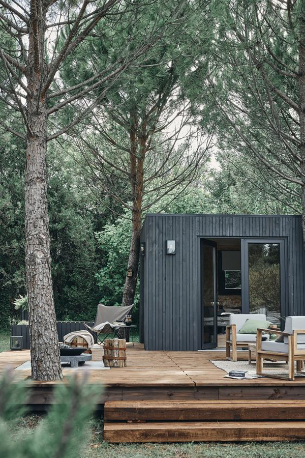 wood-tiny-house-with-deck-retreat