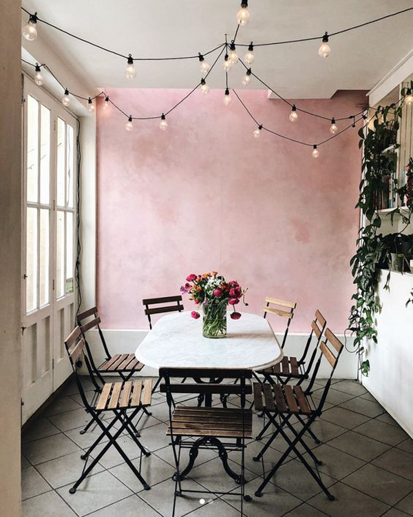 cute-dining-room-with-pink-wall-and-string-light