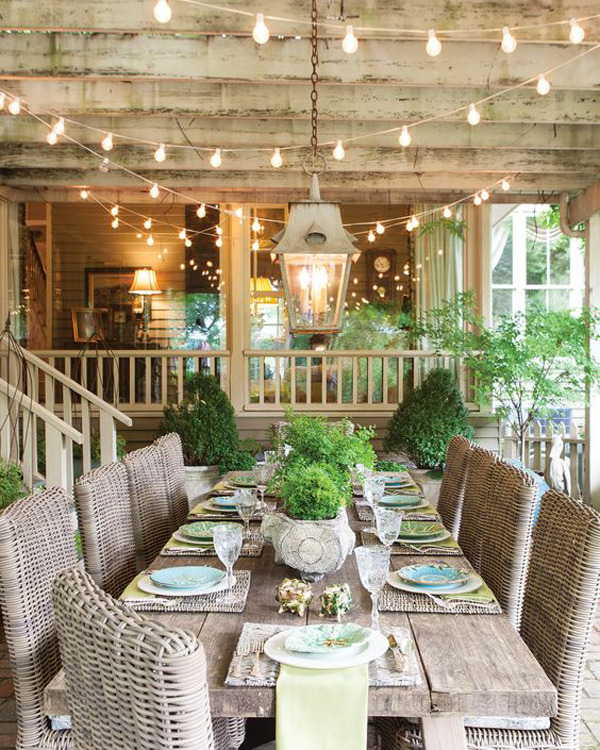 indoor-outdoor-cottage-dining-room-with-string-lights