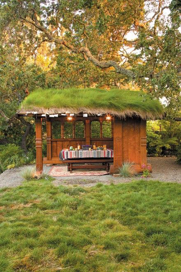 outdoor-garden-shed-with-green-roof-and-dining-area