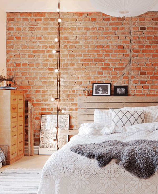 industrial-brick-bedroom-with-string-light