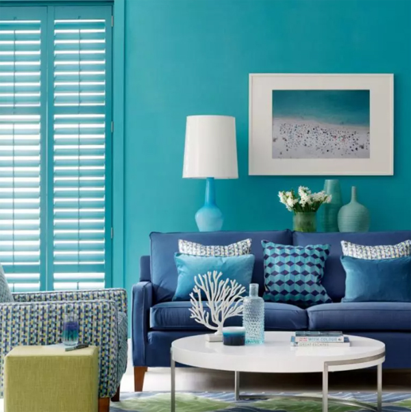 stylish-blue-living-room-with-window-shutters