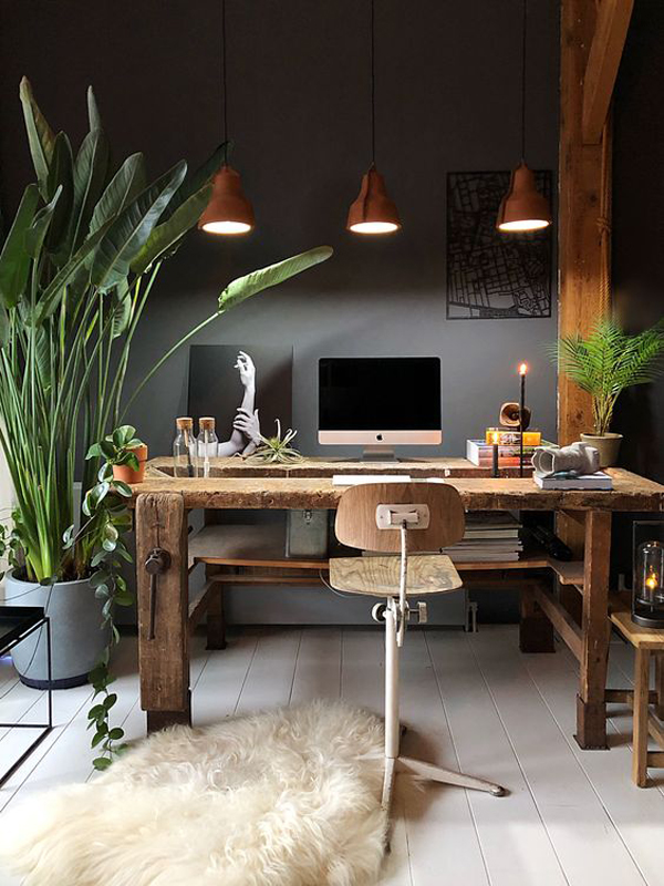 dark-industrial-home-office-with-indoor-plants