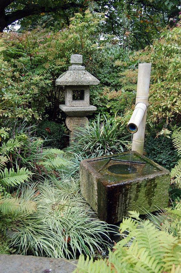 traditional-japanese-water-features-with-rock-lantern