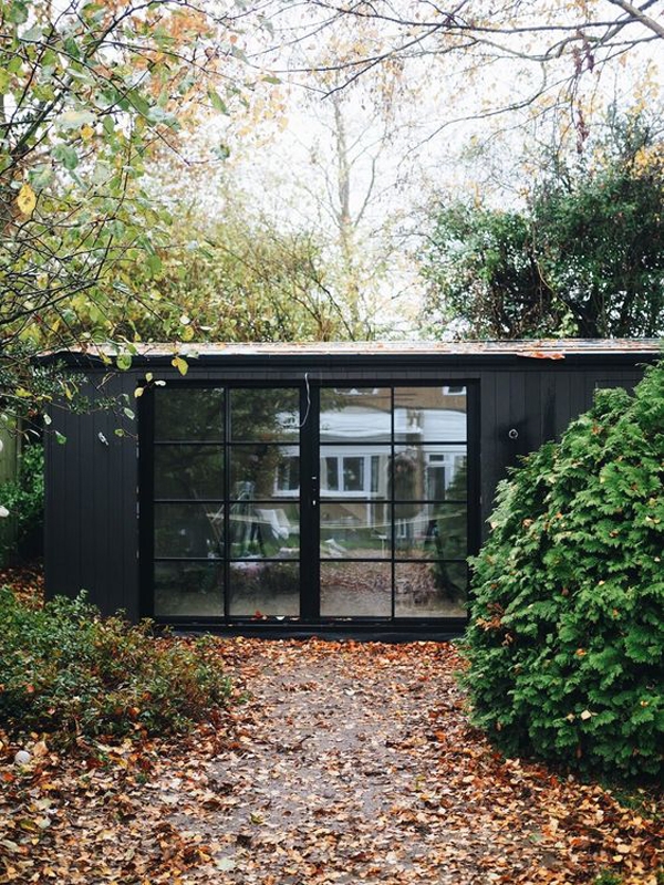 black-she-shed-office-design-in-the-garden