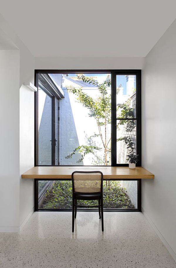 minimalist-open-home-office-with-small-garden-view
