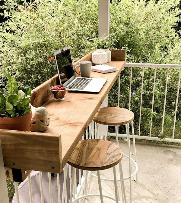space-saving-balcony-with-wood-workspace-table