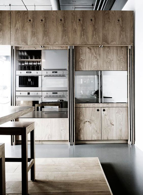 minimalist-hidden-kitchen-with-wood-accents