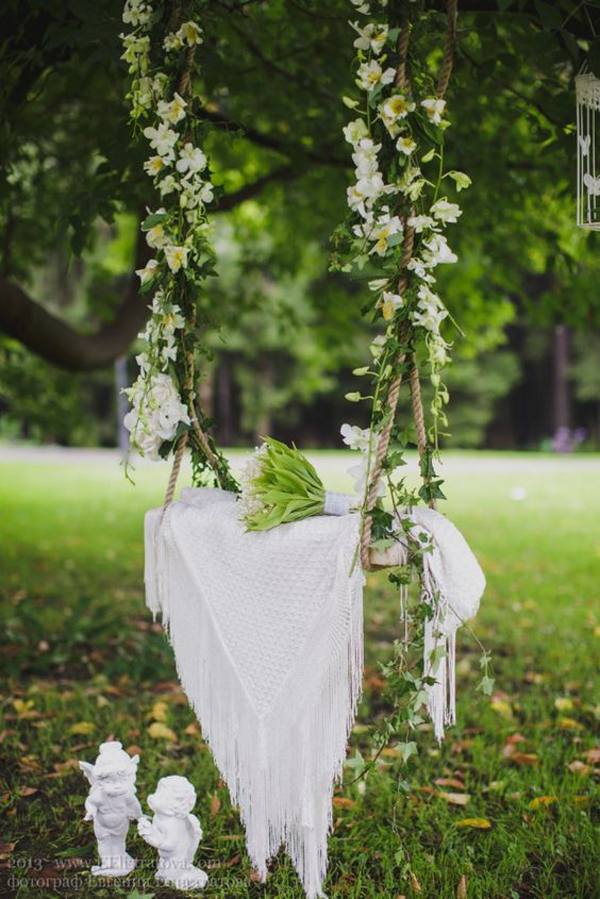 stylish-white-floral-swing-decor-for-wedding