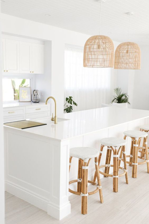 white-kitchen-island-with-basket-pendants