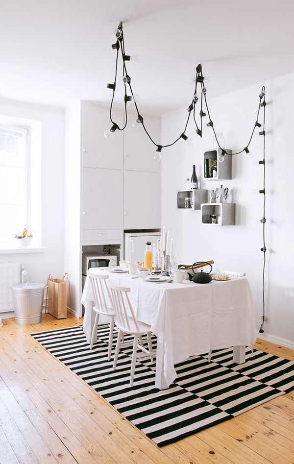 stylish-white-dining-room-with-string-light-decor