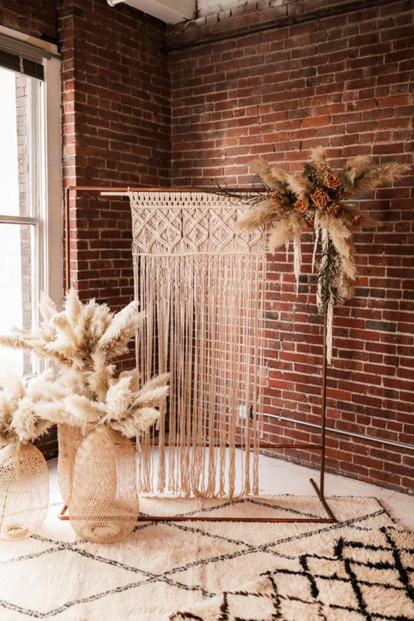 simple-boho-inspired-wedding-backdrop-with-brick-exposed