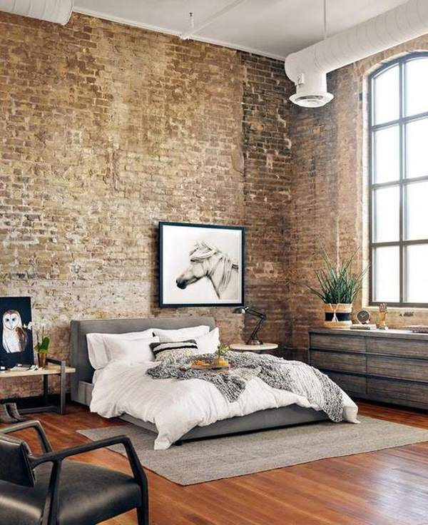 industrial-style-bedroom-with-brick-exposed-and-white-horse-wall-art