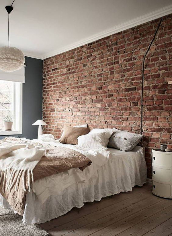 blue-bedroom-design-with-exposed-brick-wall