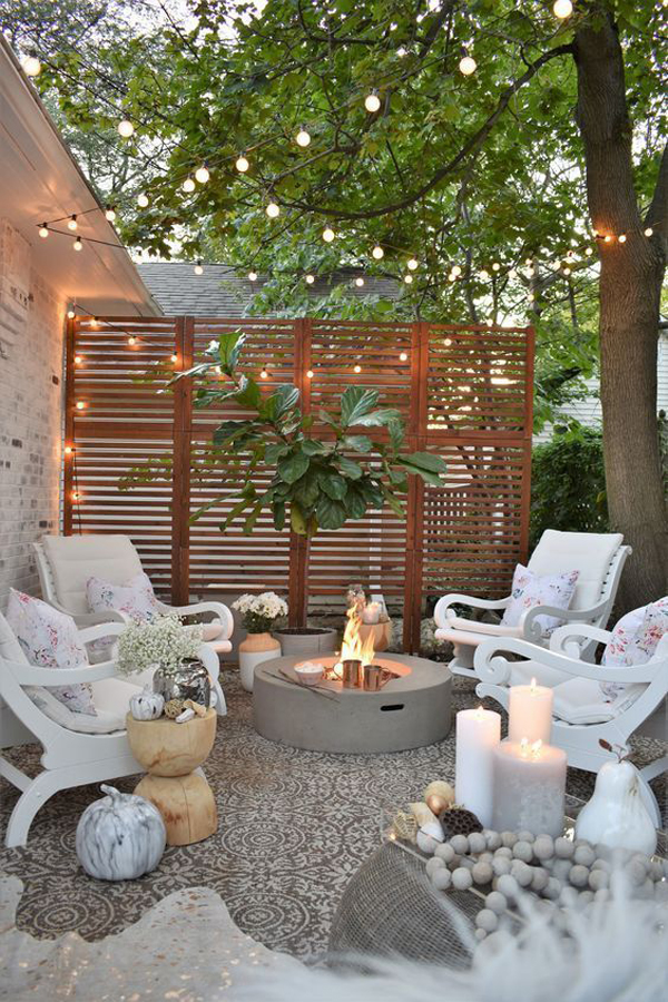 outdoor-lounge-area-with-string-light-and-firepit