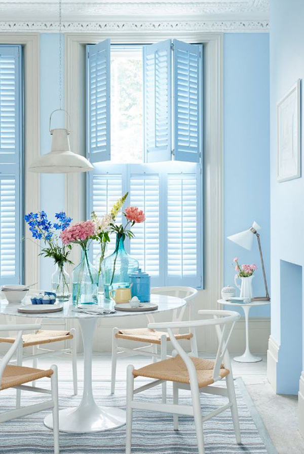 small-round-dining-space-with-pastel-blue-window