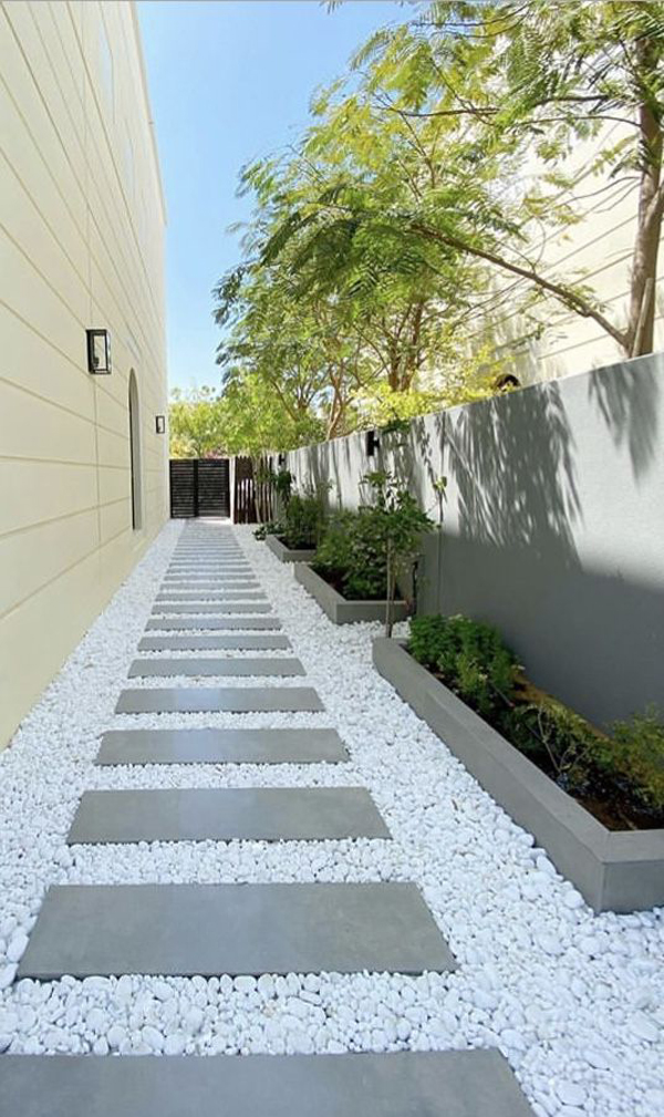 white-stone-pathway-for-side-yard-garden