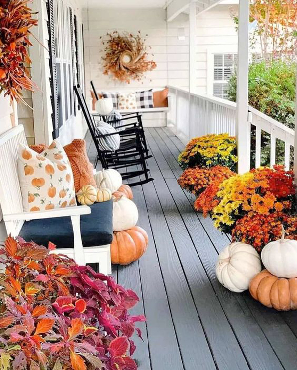 most-beautiful-fall-porch-decor-with-rocking-chair-and-floral-arrangement
