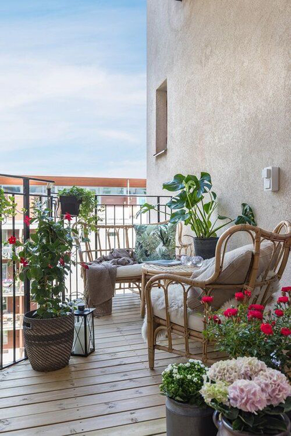 small-french-balcony-with-rattan-furniture
