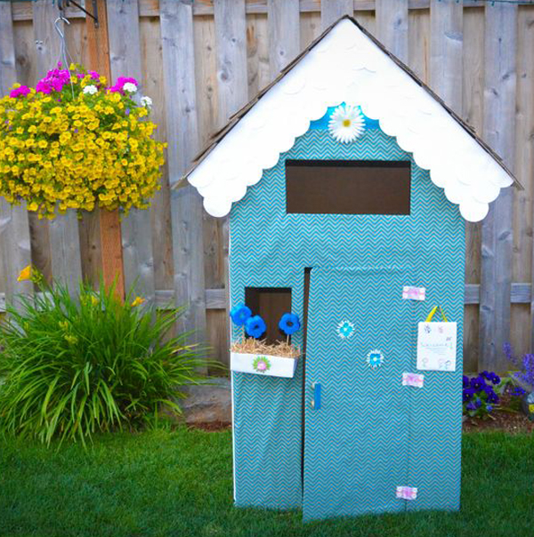 adorable-cardboard-playhouse-in-the-backyard