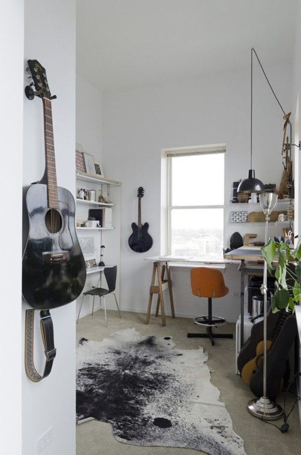 masculine-workspace-with-guitar-stand