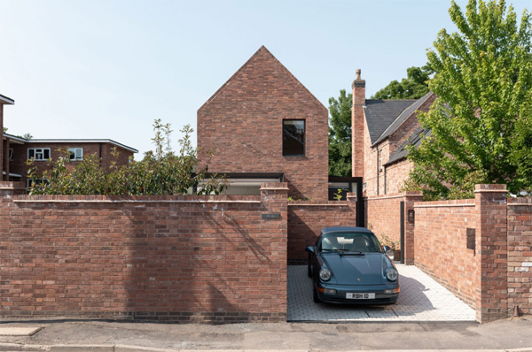 contempory-mill-lodge-front-house-with-car-garage