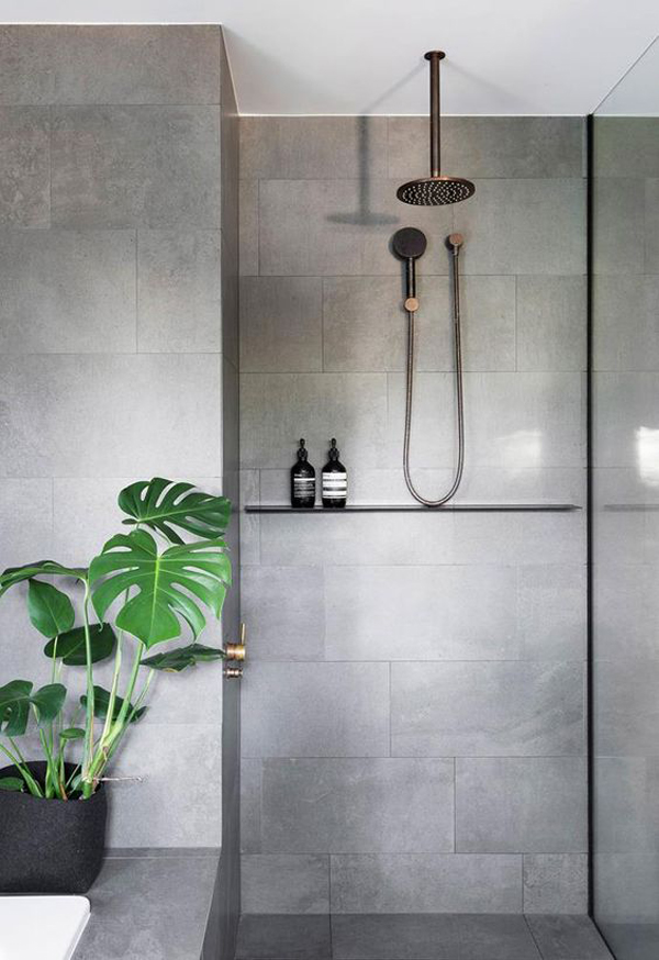 small-stone-tiles-bathroom-with-houseplants