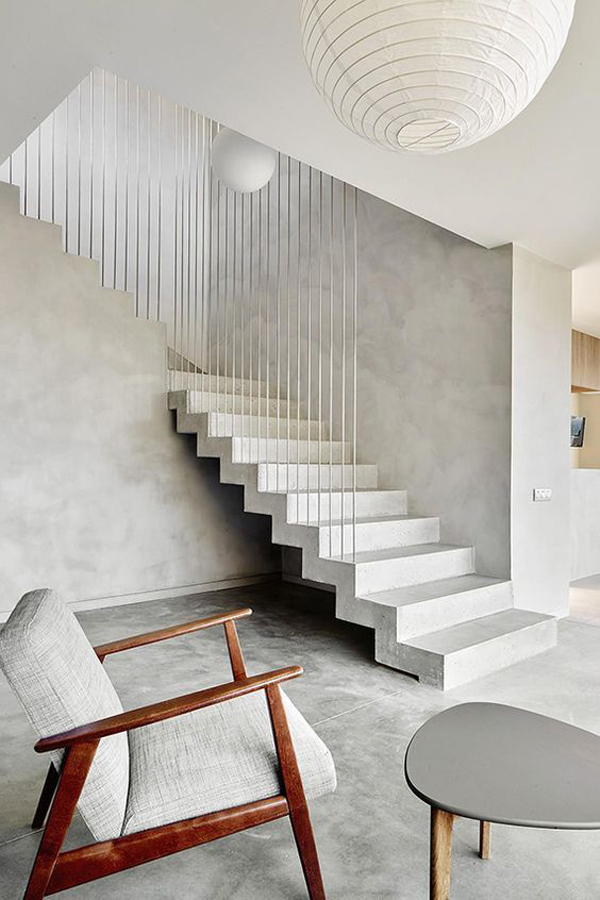 sophisticated-interiors-with-concrete-staircase