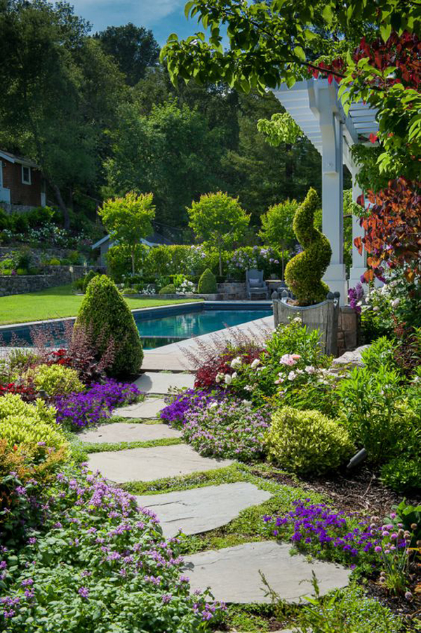 traditional-cottage-stepping-stone-walkways-into-pool