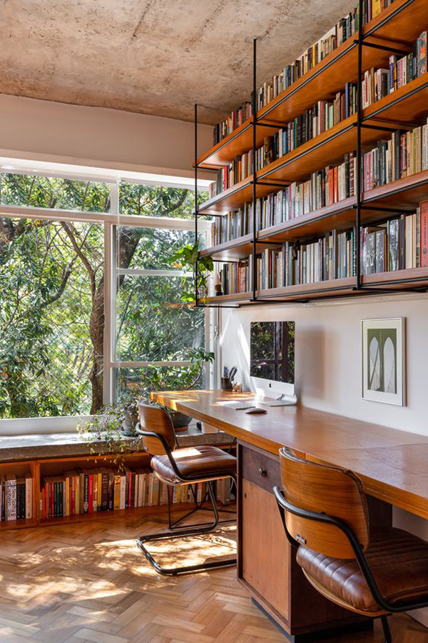 open-home-office-with-library-walls