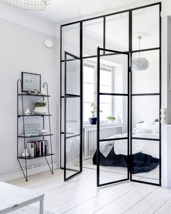 tiny-bedroom-apartment-with-framed-glass-dividers