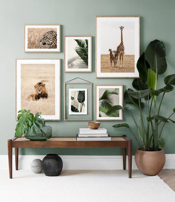 gallery-wall-layout-with-bench-and-houseplant