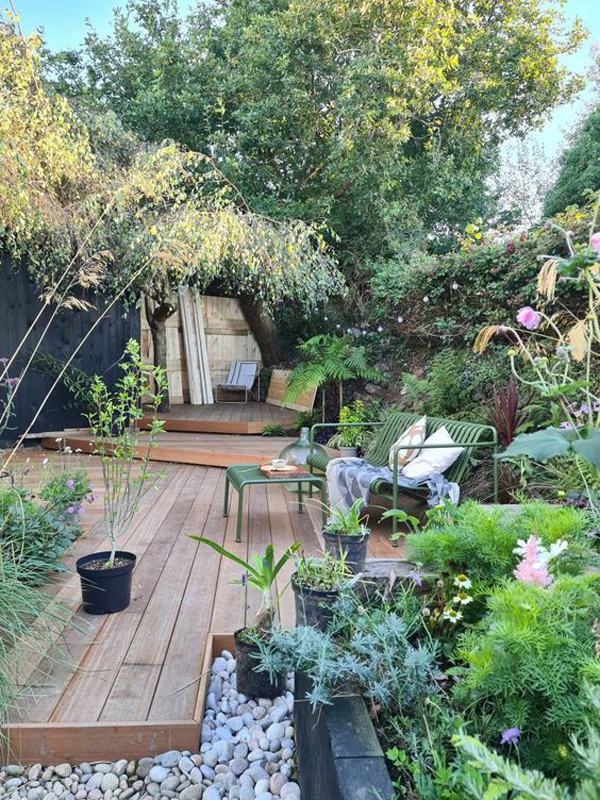 lush-small-garden-with-hardwood-deck