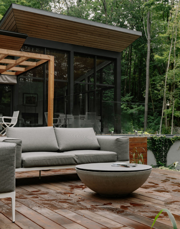 cozy-patio-deck-with-forest-landscaping