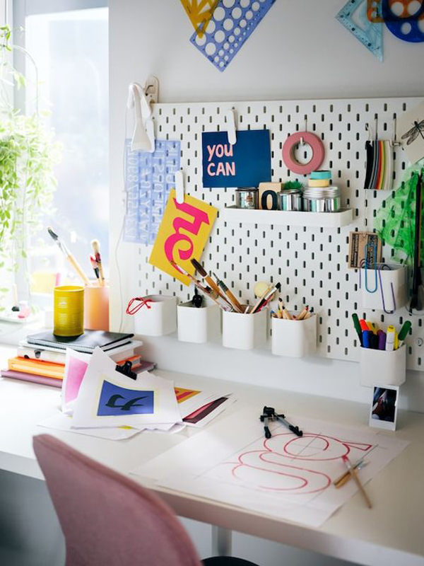 open-home-office-with-pegboard-storage