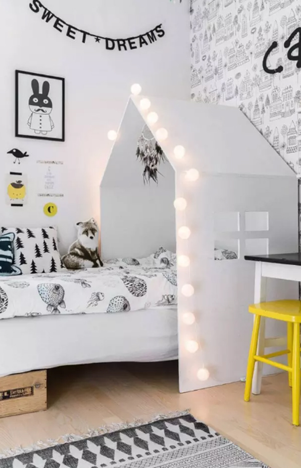 simple-nordic-kids-room-with-canopy-headboard