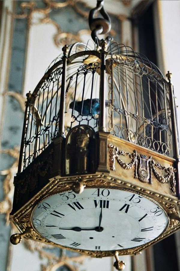 beautiful-vintage-birdcage-with-clock-decor
