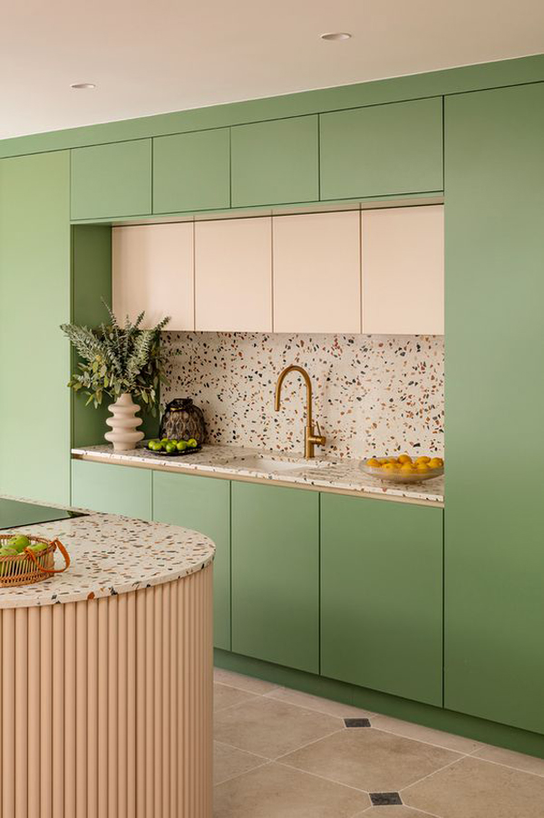 built-in-green-kitchen-cabinet-with-terrazzo-backsplash