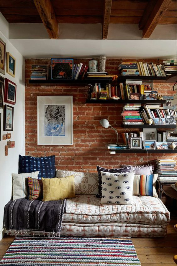 small-boho-reading-nook-with-exposed-brick